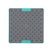 A turquoise square hard case rubber mat with plus signs inside.
