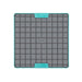 A turquoise square hard case rubber mat with squares inside.